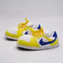 CHAUSSONS INSPI AJ1 TRAVIS SCOTT CANARY